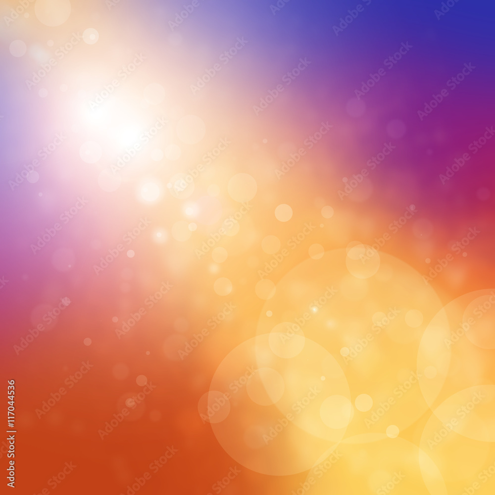blurred white bokeh lights on colorful gold stream of light in blue purple pink and orange background sunrise or sunset in the sky concept blurred white bokeh lights on colorful gold stream of light in blue purple pink and orange background sunrise or sunset in the sky concept