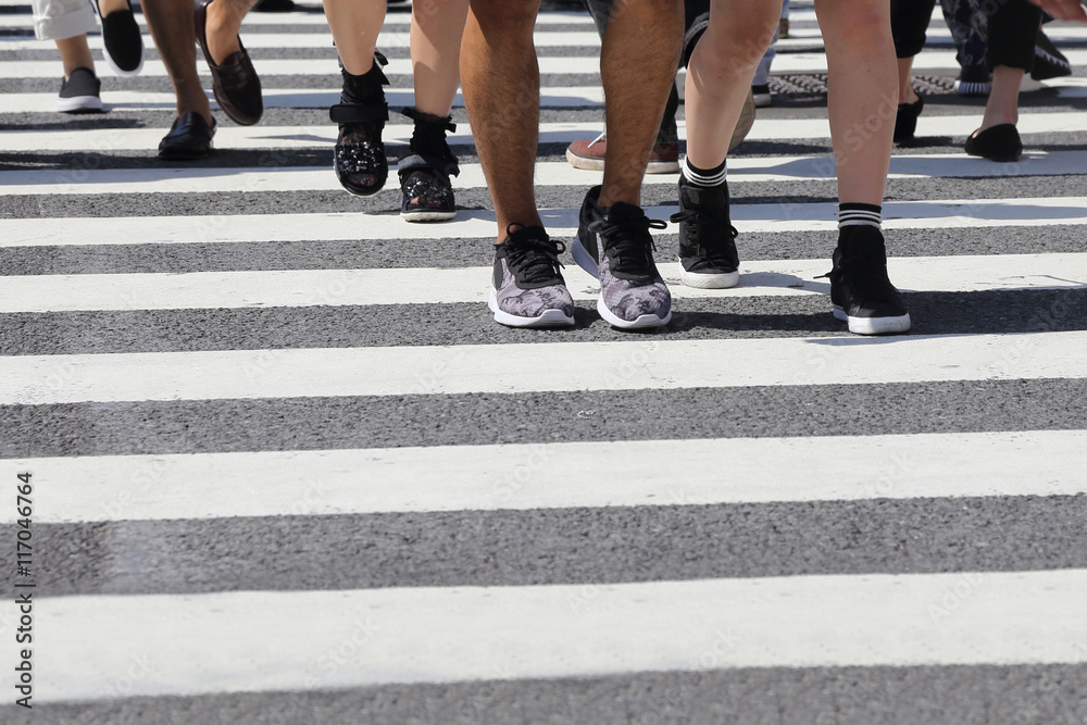 unidentified people legs crossing street unidentified people legs crossing street