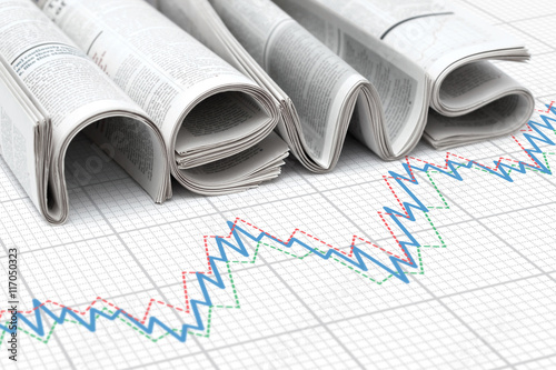 Folded newspapers and graph. Concept of business and financial news