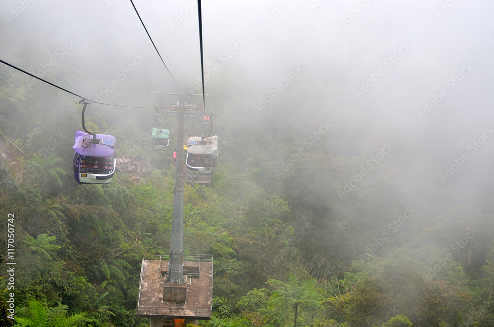Cable car ferrying passengers up and down the mountain.. Cable car ferrying passengers up and down the mountain..