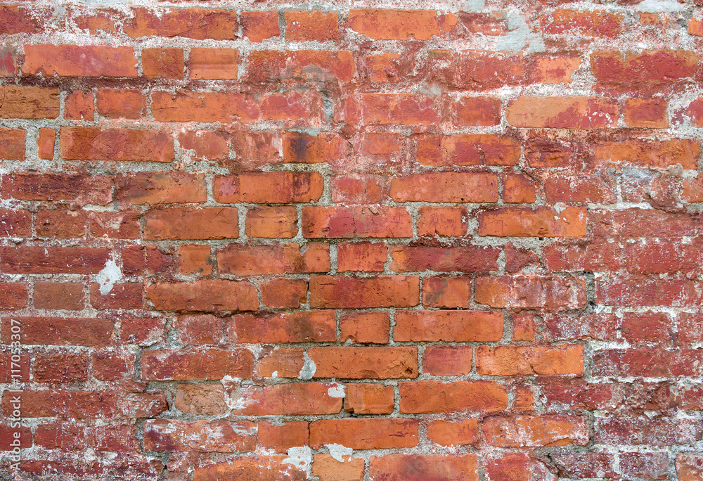 Naklejka premium Red vintage old brick wall texture background