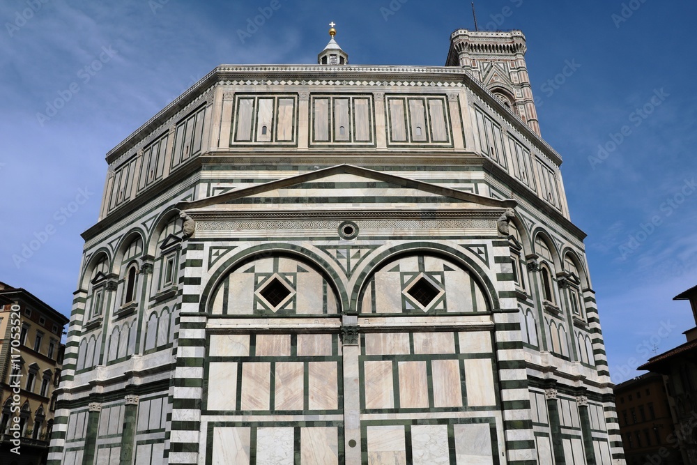 Baptistry of San Giovanni under blue sky in Florence Italy