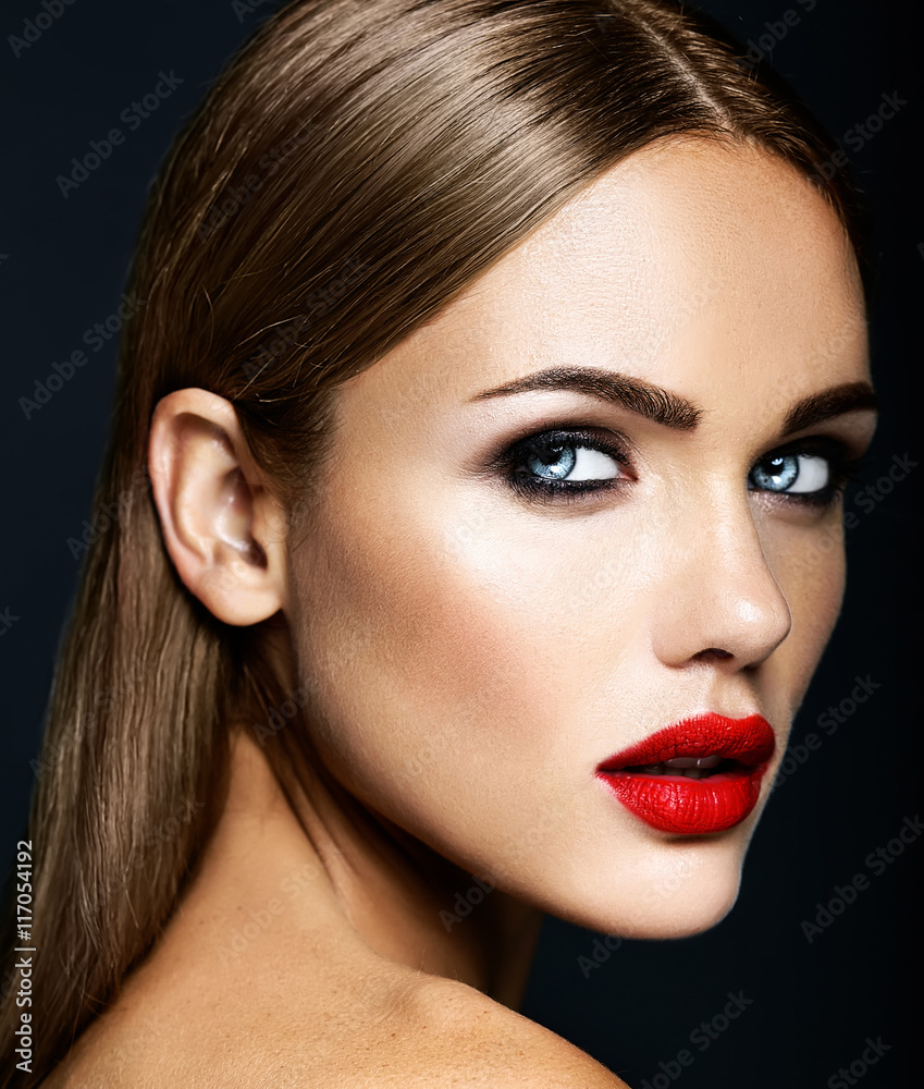 Fototapeta premium sensual glamour portrait of beautiful woman model lady with fresh daily makeup with red lips color and clean healthy skin face