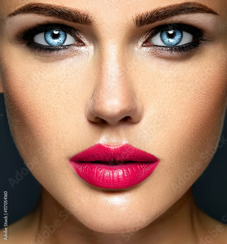 closeup portrat of sensual glamour beautiful woman model lady with fresh daily makeup with red lips and clean healthy skin face