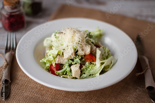 Salad with chicken, mozzarella and cherry tomatoes.