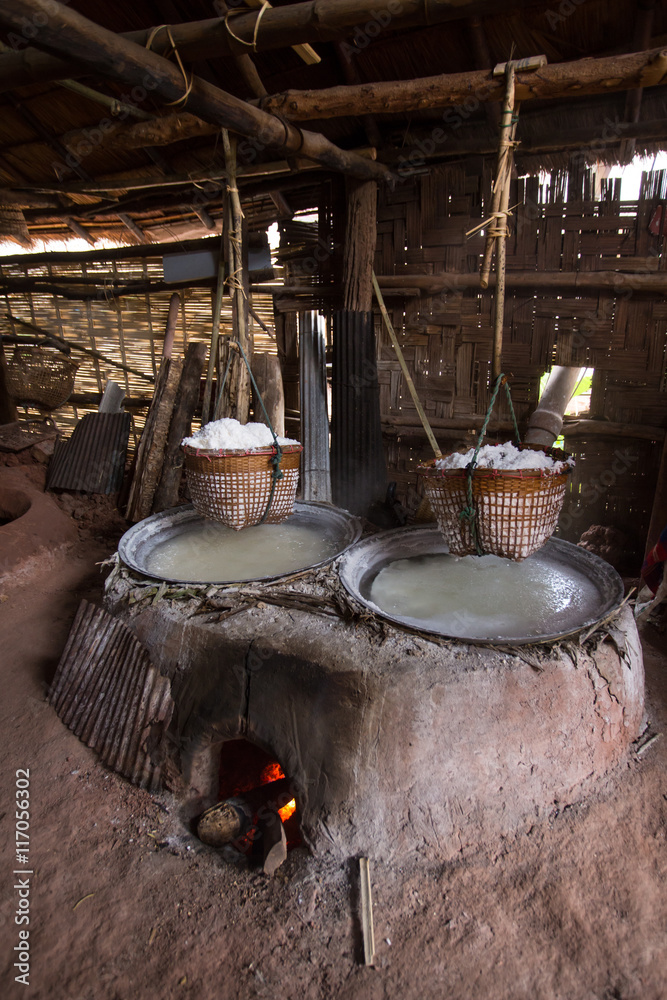 An ancient offshore salt well equipment hanging in the home made factory Bor-Klauer District, Nan, Thailand