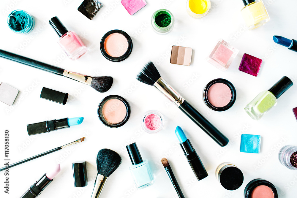 flat lay female cosmetics collage with lipstick, brush on white background. top view set flat lay female cosmetics collage with lipstick, brush on white background. top view set