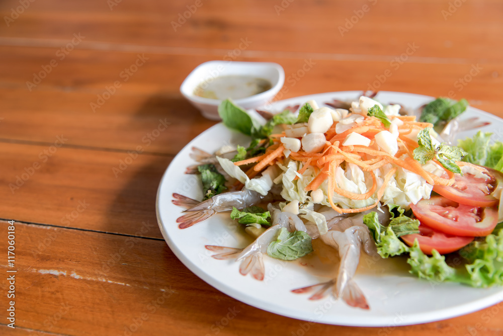 shrimp in fish sauce on wood table shrimp in fish sauce on wood table