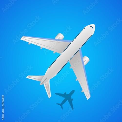 Airplane in the air with shadow.