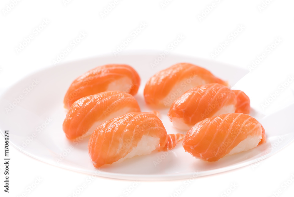 Fresh japanese salmon sushi in plate on white background Fresh japanese salmon sushi in plate on white background