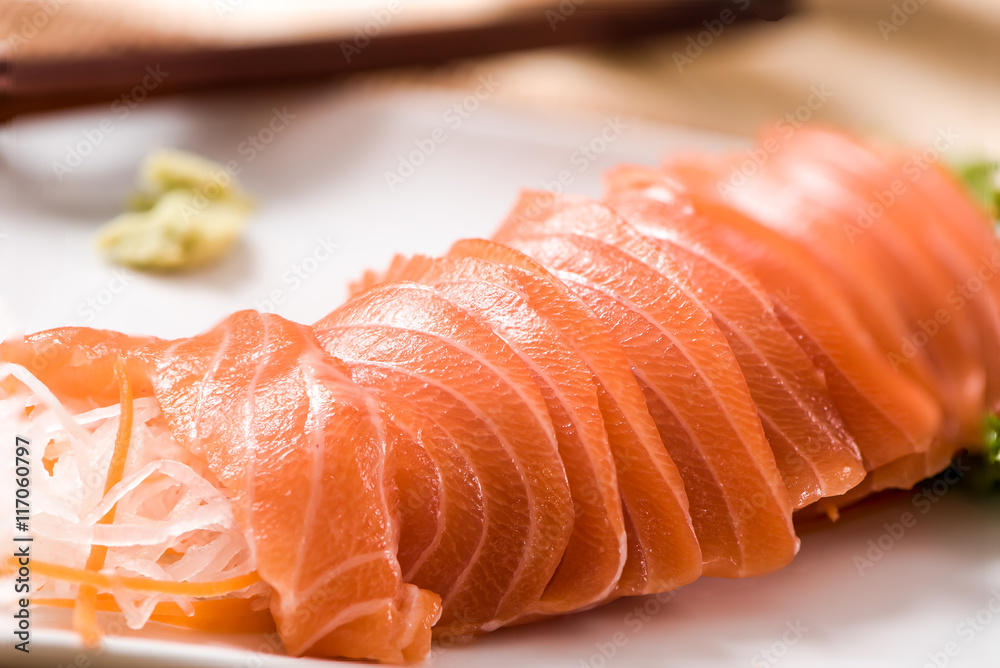 Salmon Sashimi in plate on wood table , japan food