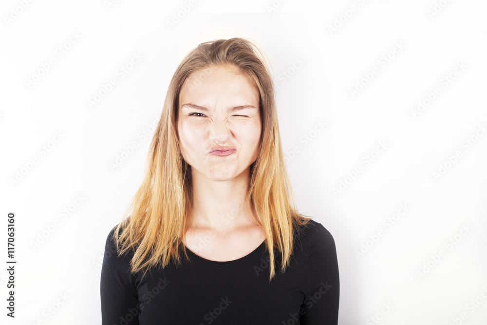 Portrait of blonde woman making a silly face Portrait of blonde woman making a silly face