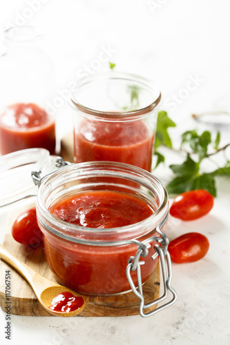 Homemade ketchup with tomatoes, chili and peaches