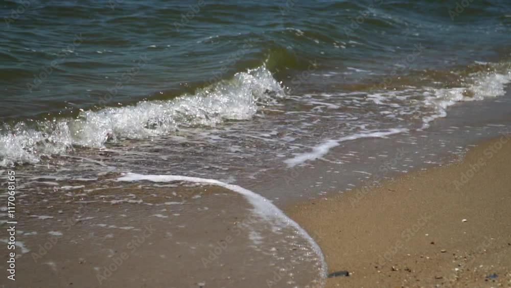 Sea waves on the beach. sunny day. Slow motion,high speed camera Sea waves on the beach. sunny day. Slow motion,high speed camera