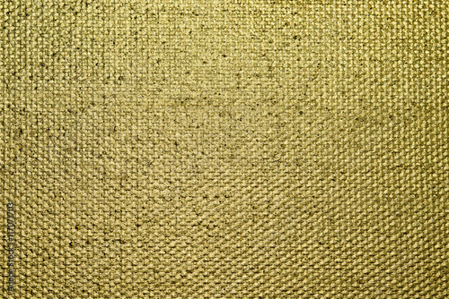 Golden angemalte Leinwand als Hintergrund - Nahaufnahme photo