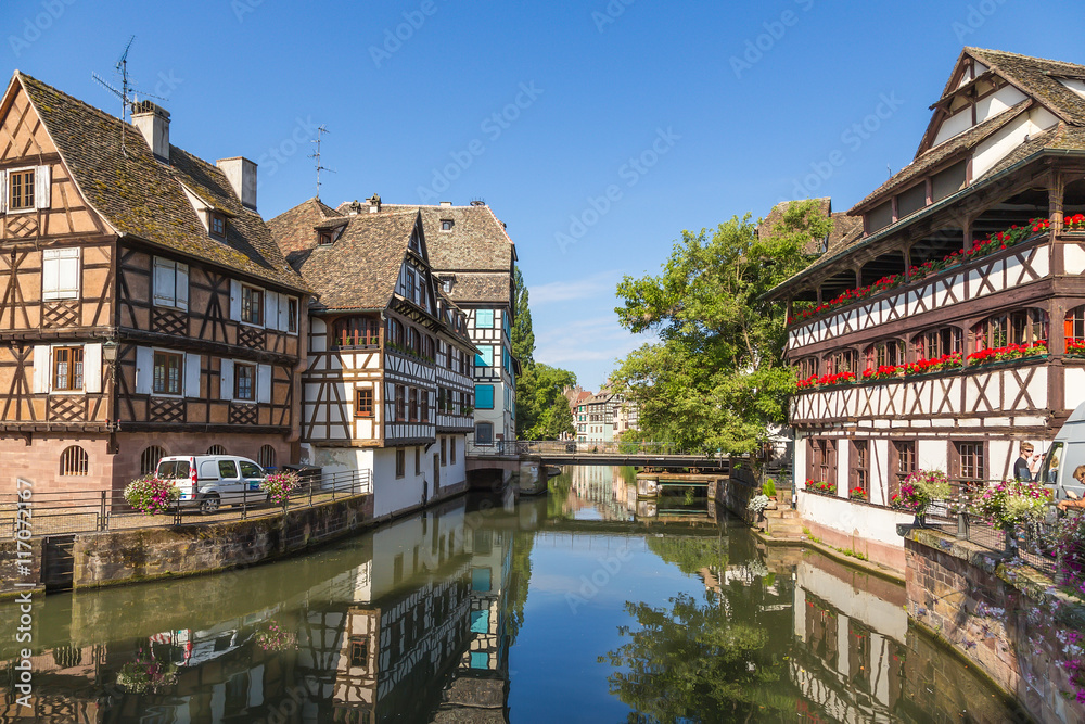 Strasbourg, France. The picturesque landscape with reflection in the water of old buildings in the quarter 