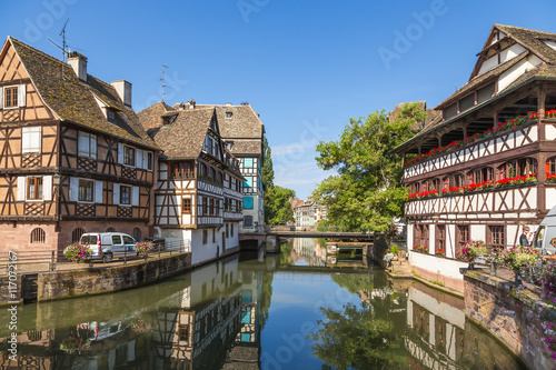 Strasbourg, France. The picturesque landscape with reflection in the water of old buildings in the quarter "Petite France"