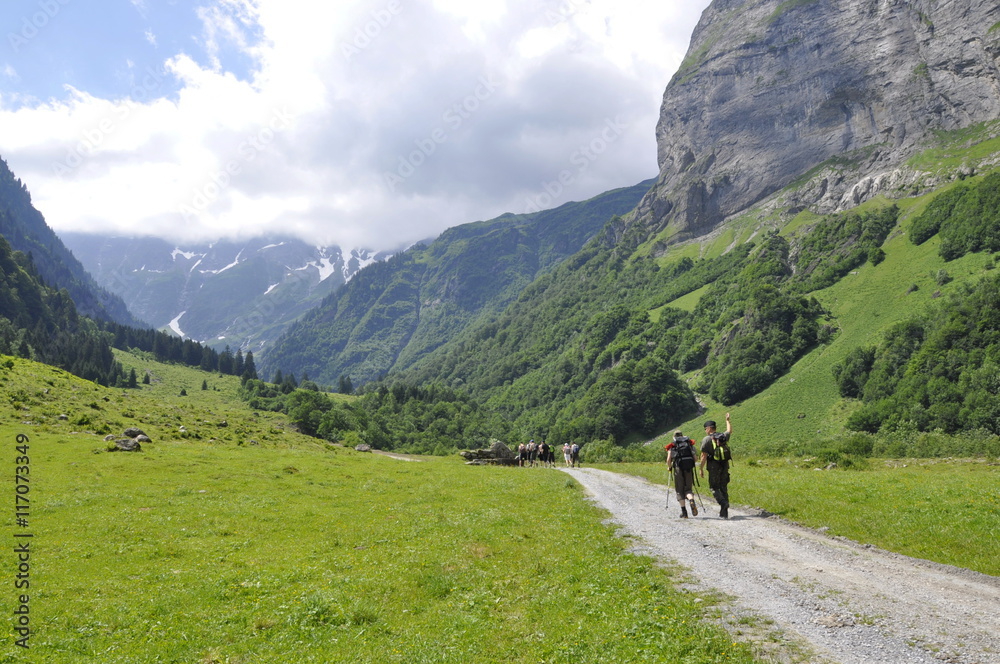 Hikers on alpine glacier mountains in switzerland Hikers on alpine glacier mountains in switzerland