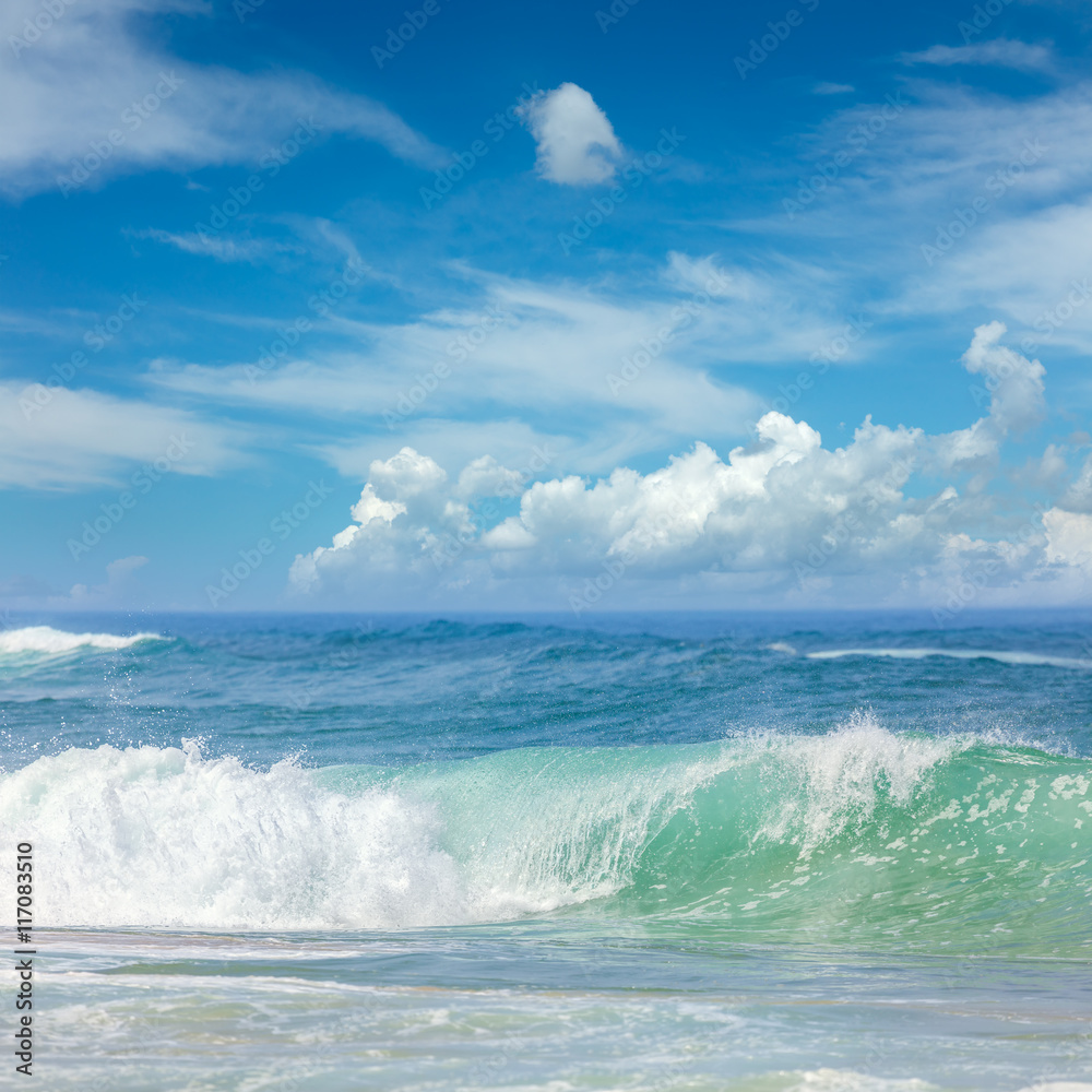 Fototapeta premium Fantastic Waves in the warm Sea Water and blue sky