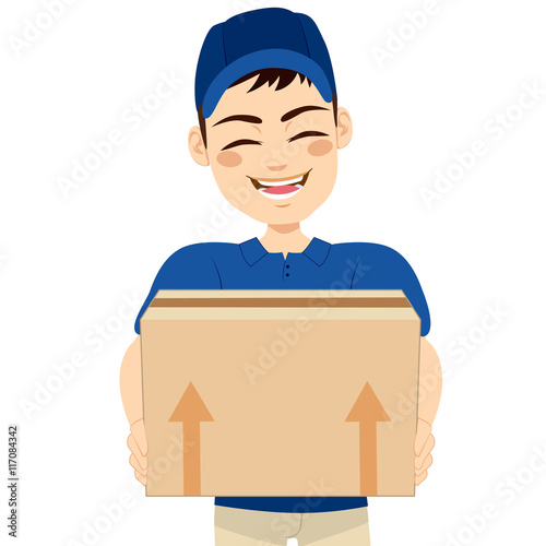 Happy young delivery man holding box delivering mail package