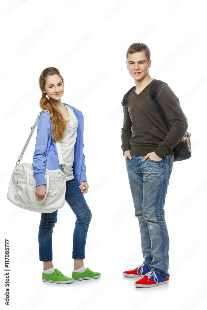 Fototapeta premium Teenage boy and girl isolated on white