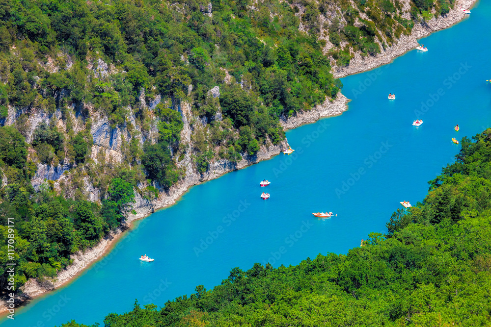 Amazing View Of The Gorges Du Verdon Canyon with boats in Provence, France. Provence-Alpes-Cote d'Azur.