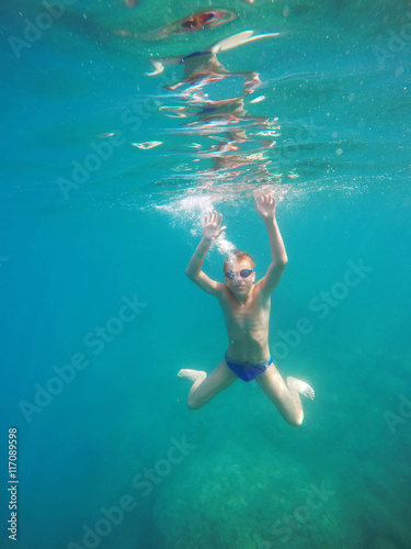 man dives into the sea