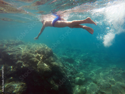 man swim in the sea