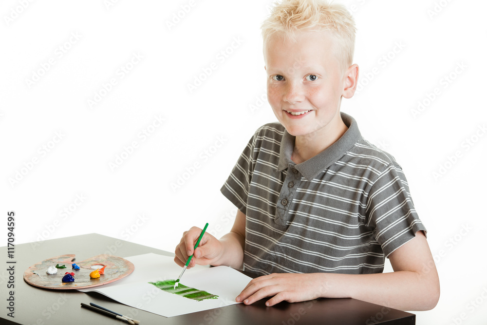 Creative young boy painting with watercolors Creative young boy painting with watercolors