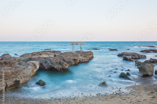 Japanese shrine gate and sea at Oarai city , Ibaraki photo