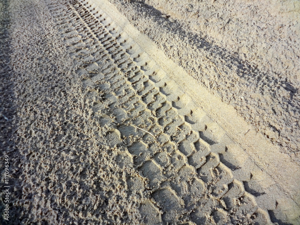 SUV wheel trace on the desert road after the rain in the Western Kazakhstan SUV wheel trace on the desert road after the rain in the Western Kazakhstan