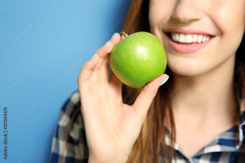 Beautiful girl eating apple, closeup Beautiful girl eating apple, closeup