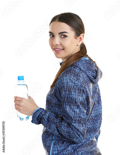 Young woman with bottle of ...