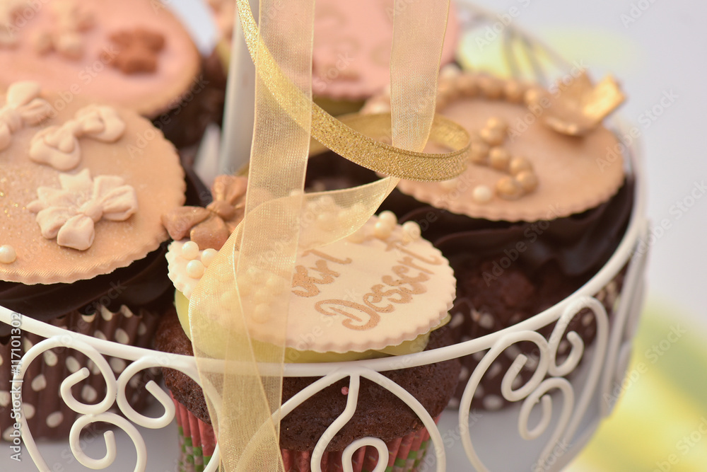Muffins with marzipan shaped arrangement of roses Muffins with marzipan shaped arrangement of roses