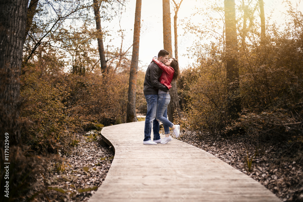 couple kissing outdoor in the park