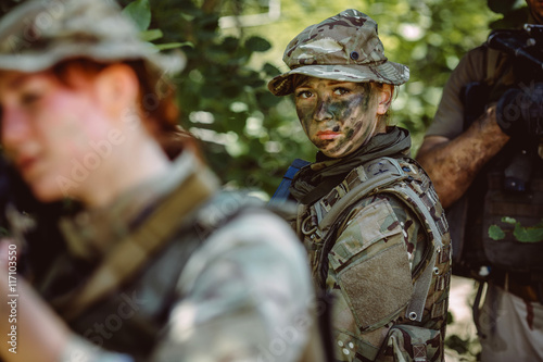 Special forces soldiers with weapon take part in military maneuv