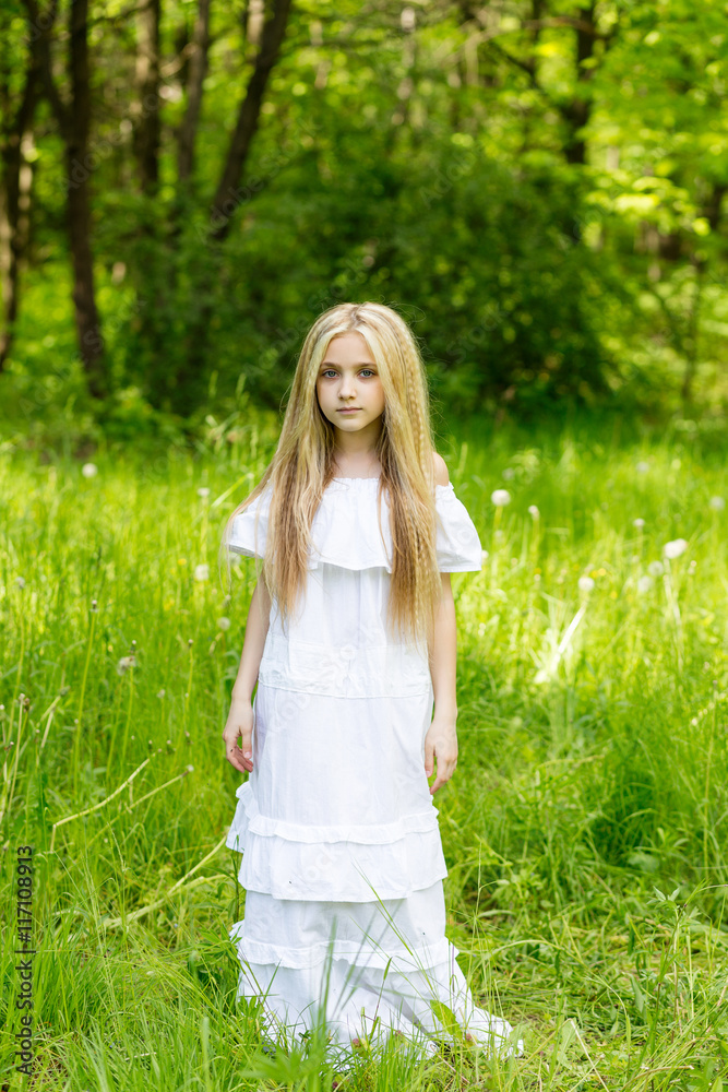 Portrait cute blonde girl outdoors in summer Portrait cute blonde girl outdoors in summer