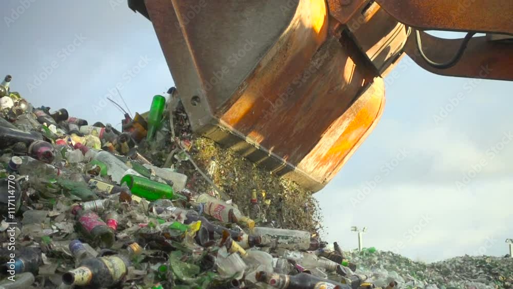 Unloading of broken glass in the enterprise. Glass recycling. Glass cullet separation. Slow motion