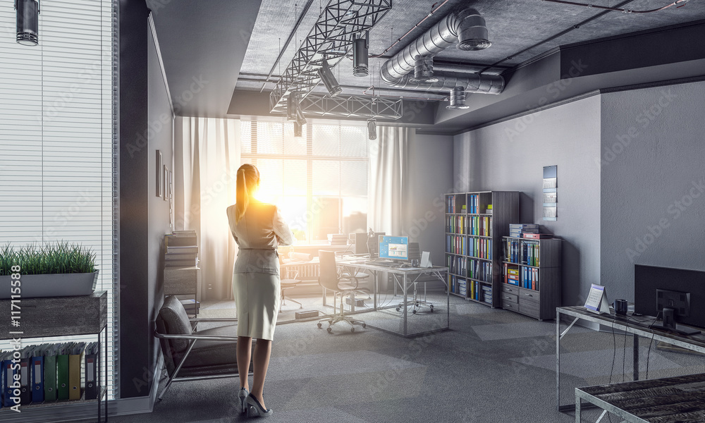 Obraz premium Businesswoman in modern office interior . Mixed media