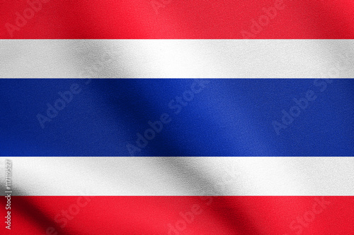 Flag of Thailand waving in wind with fabric texture