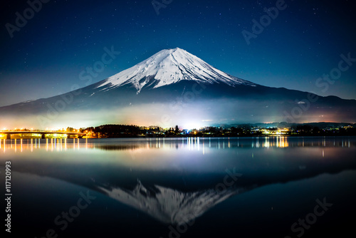 Mount Fuji reflected on Kawaguichiko lake at night