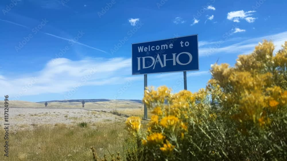 Welcome To Idaho Sign, Wide. Wide angle static shot of a blue 