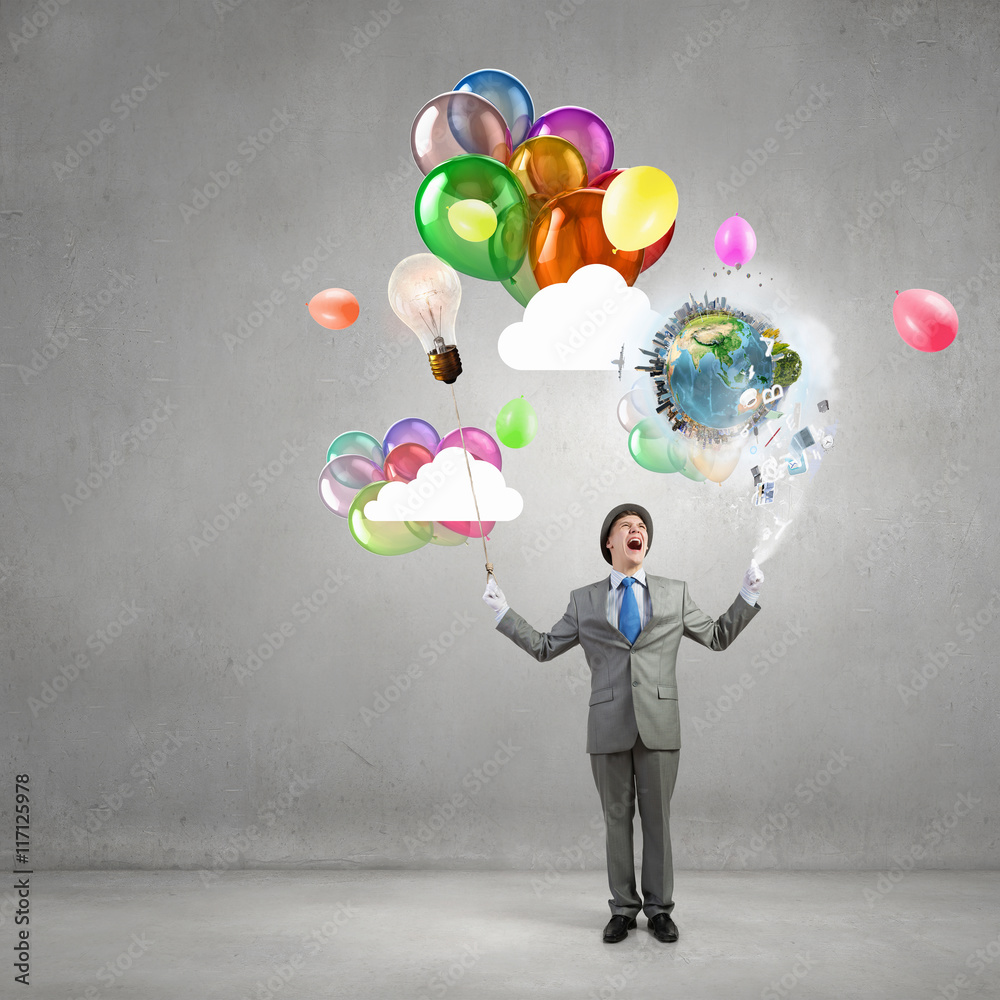 Comedian man with color balloons . Mixed media Comedian man with color balloons . Mixed media