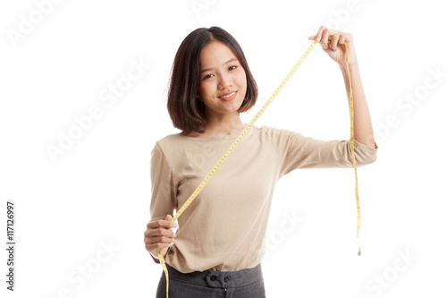 Young Asian business woman with measuring tape
