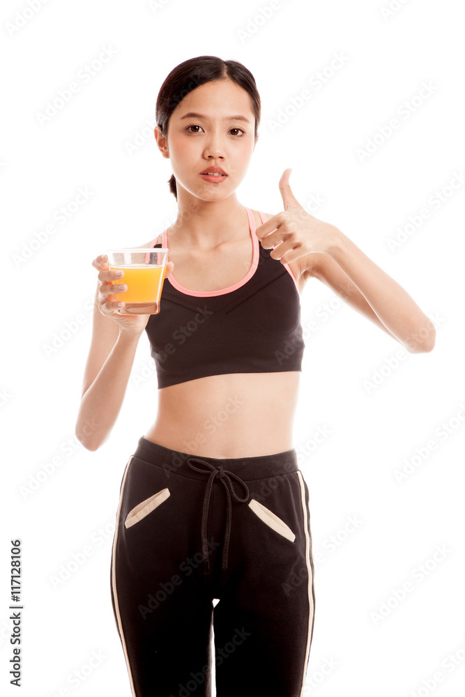 Beautiful Asian healthy girl drinking orange juice thumbs up Beautiful Asian healthy girl drinking orange juice thumbs up
