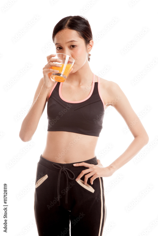 Beautiful Asian healthy girl drinking orange juice Beautiful Asian healthy girl drinking orange juice
