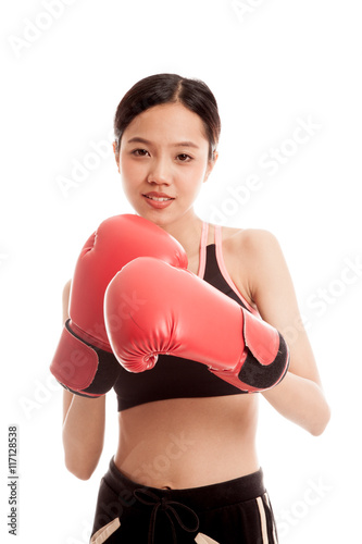 Beautiful healthy Asian girl with red boxing glove © halfbottle