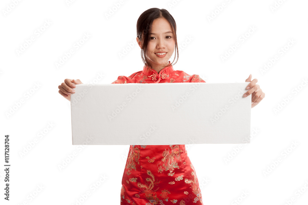 Asian girl in chinese cheongsam dress with blank sign Asian girl in chinese cheongsam dress with blank sign