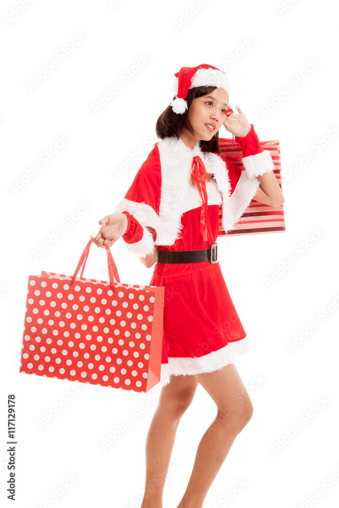Asian Christmas Santa Claus girl with shopping bags Asian Christmas Santa Claus girl with shopping bags