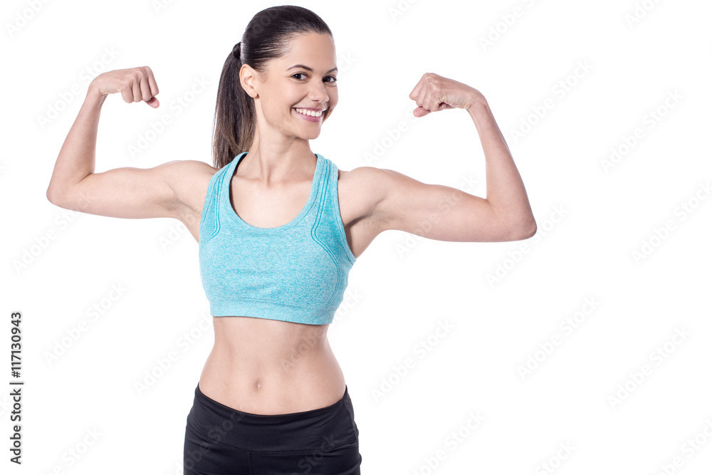 Muscular fitness trainer after her workout session Muscular fitness trainer after her workout session